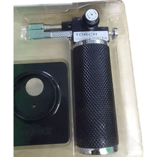Close-up of needle-point flame tip for precise dental applications
