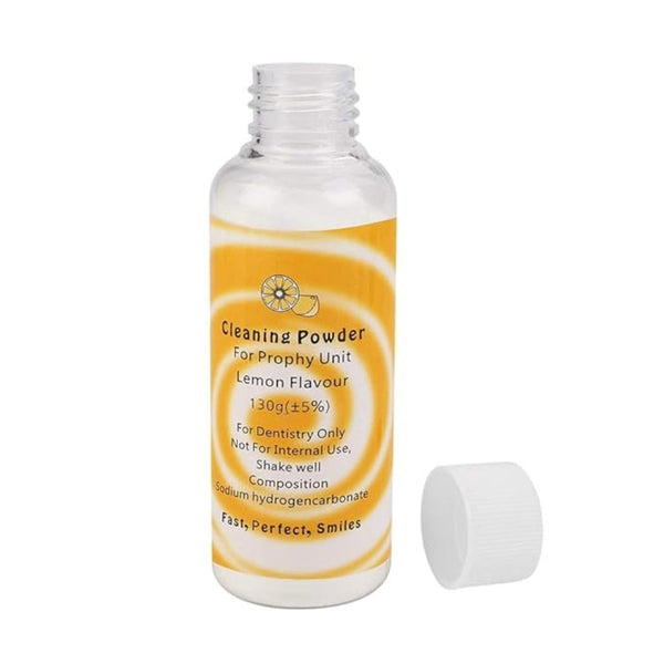 NMD NEXUS MEDODENT Dental Prophy Powder (Lemon) with air jet polisher removing dental plaque and pigment for professional tooth cleaning.