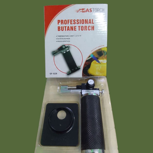 Lightweight plastic blow torch with weighted base and metal lid
